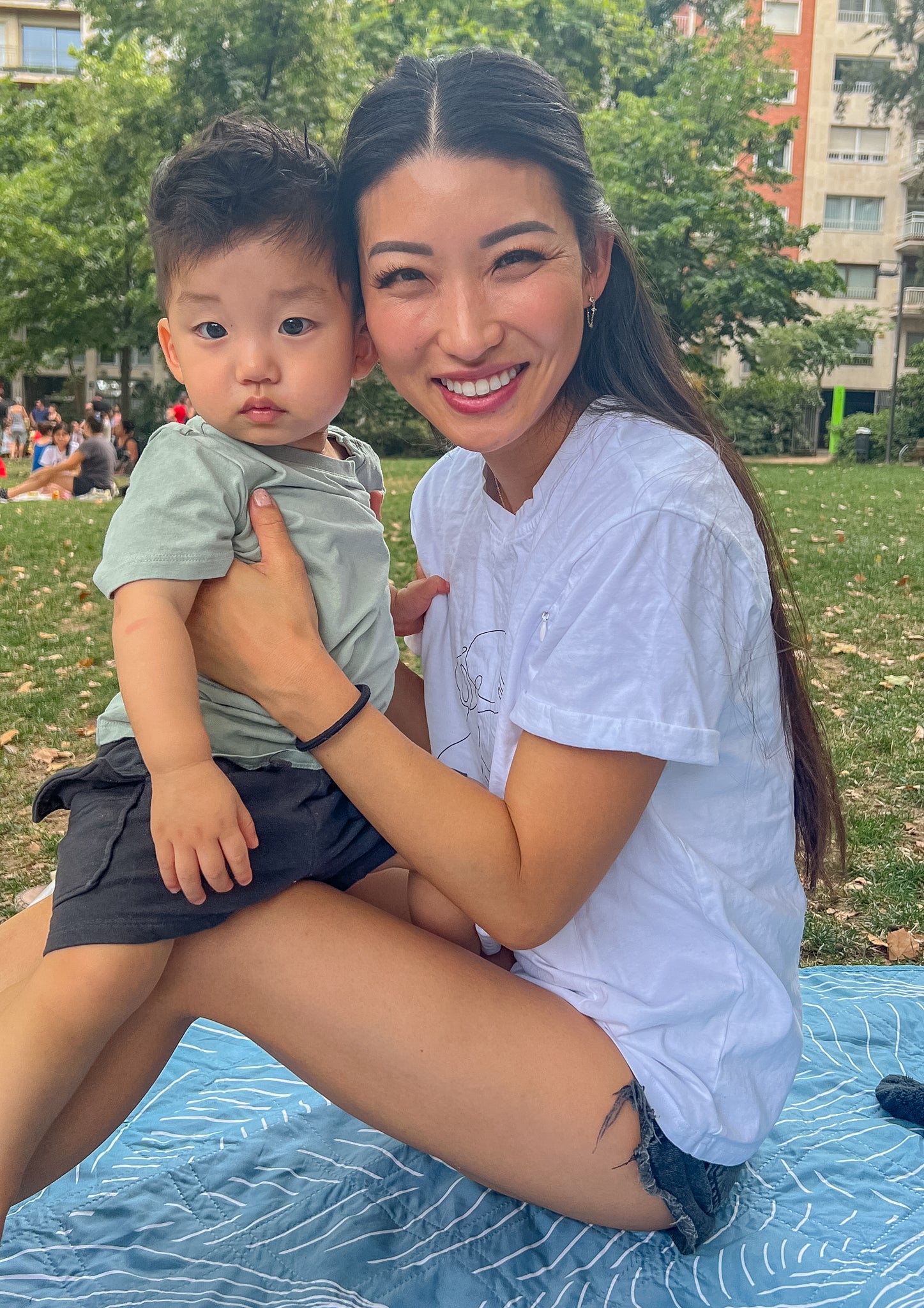 Milkmates founder wearing Motherhood Nursing Top with her baby boy
