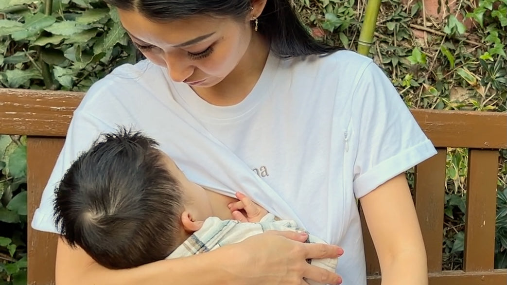mom breastfeeding baby