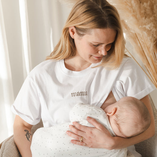 mother breastfeeding baby wearing milkmates nursing t-shirt