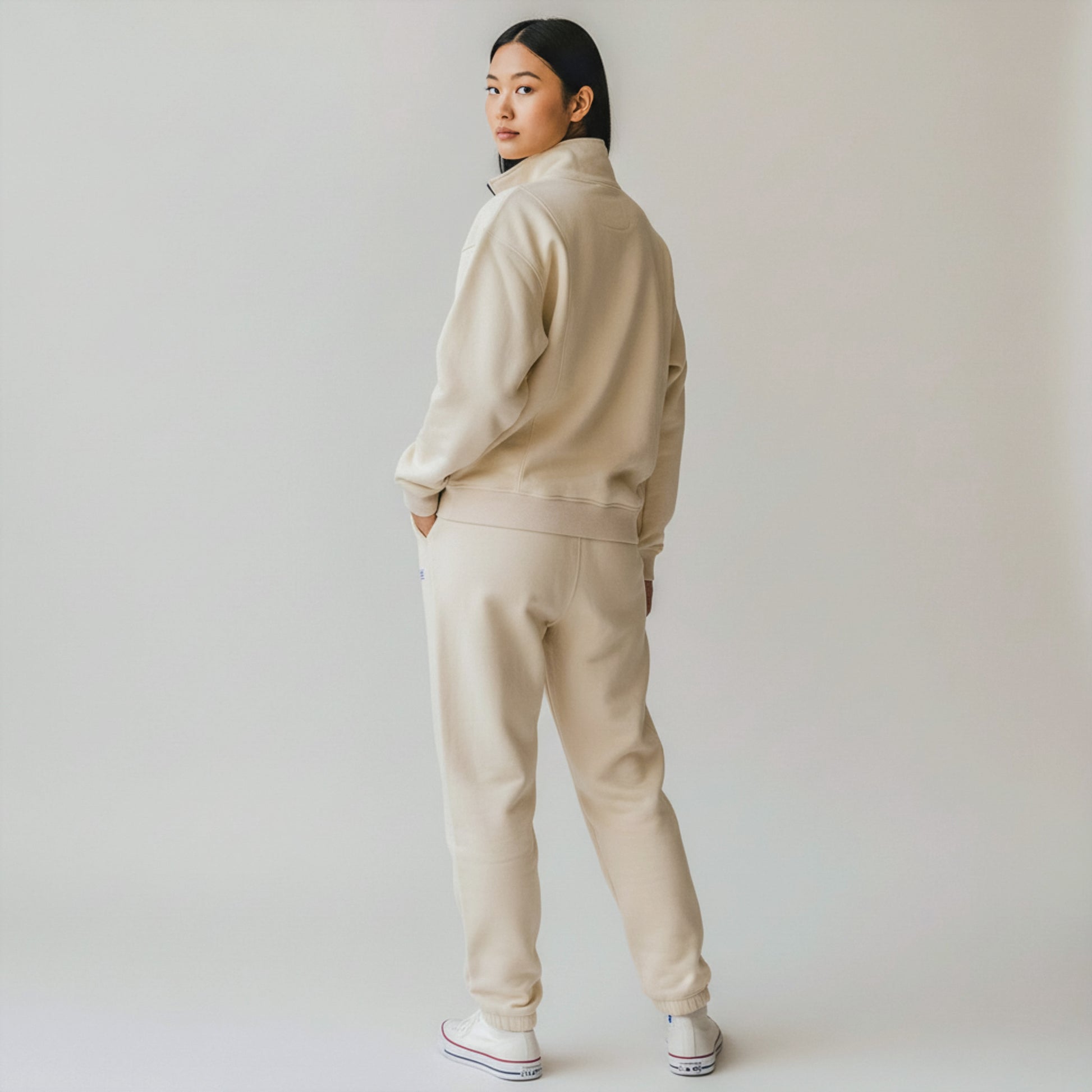 woman wearing beige milkmates nursing sweater and sweatpants set - back view