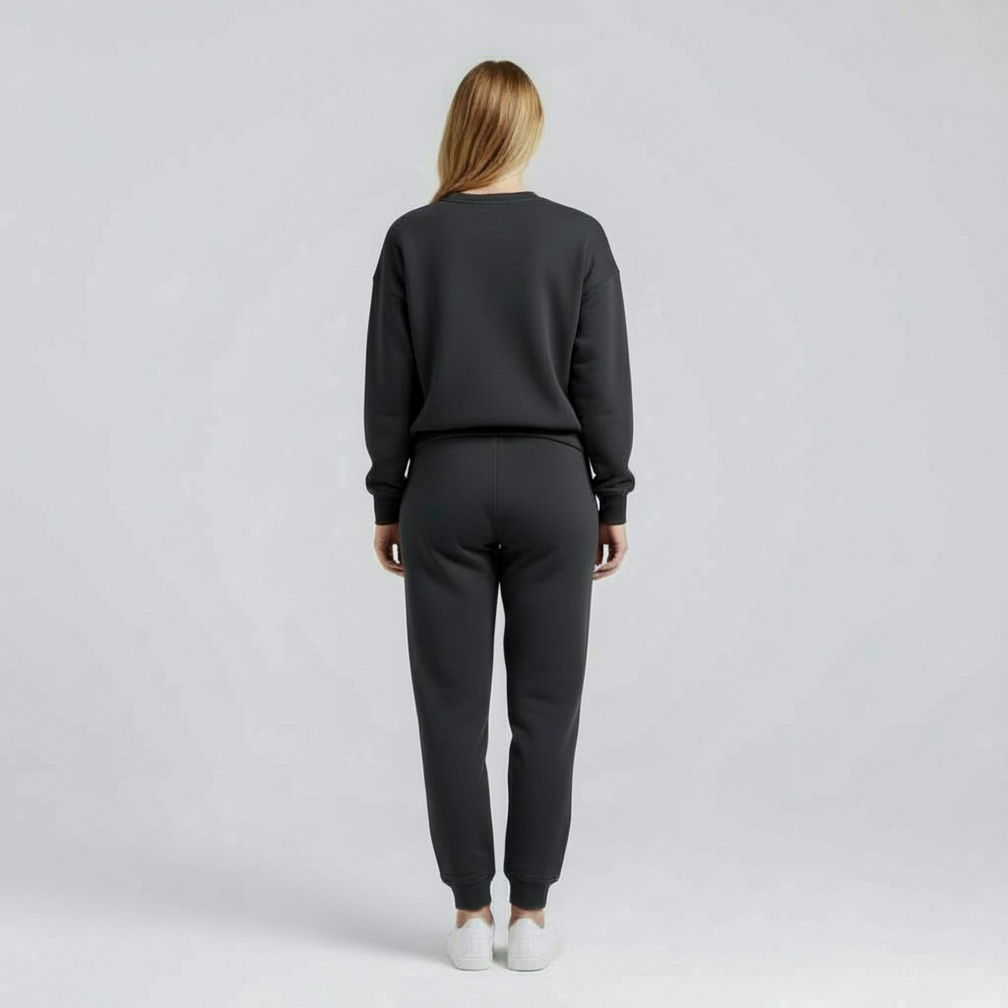Woman wearing milkmates nursing sweater and sweatpants set - back view