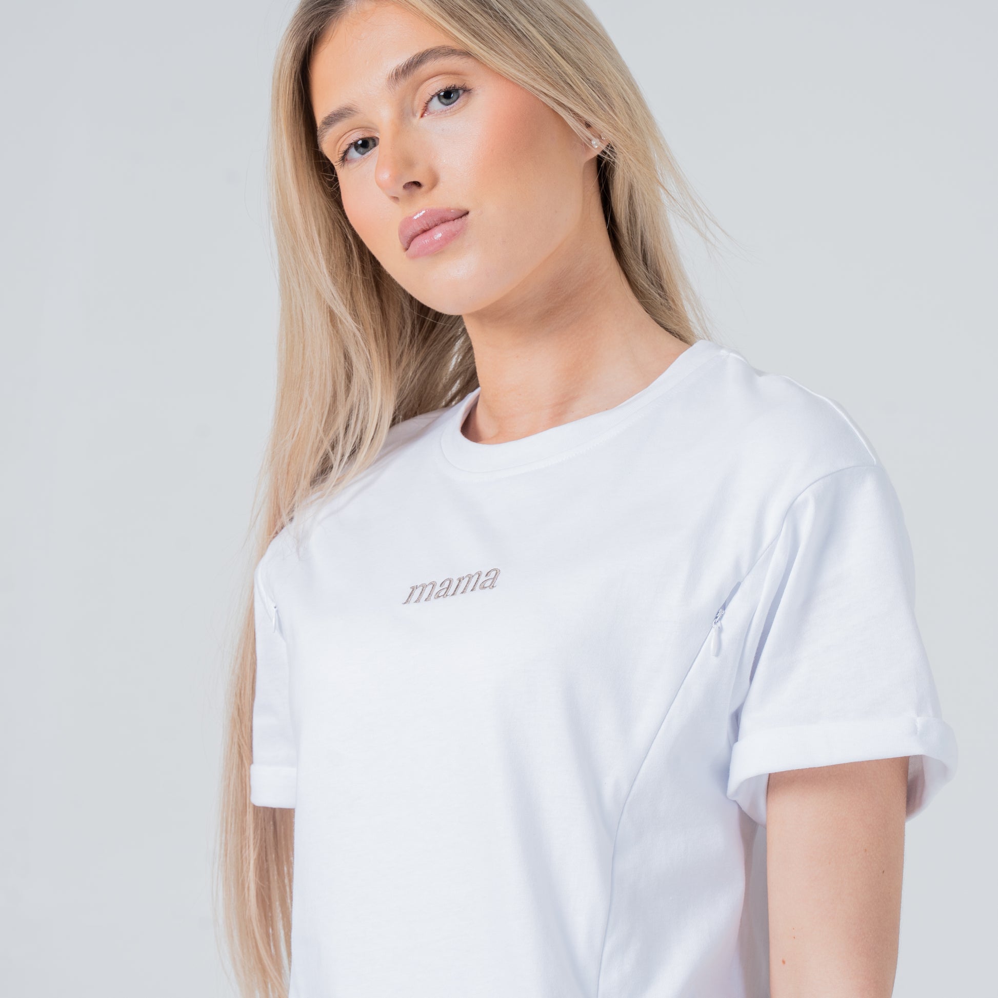 woman wearing milkmates white mama nursing tee side view