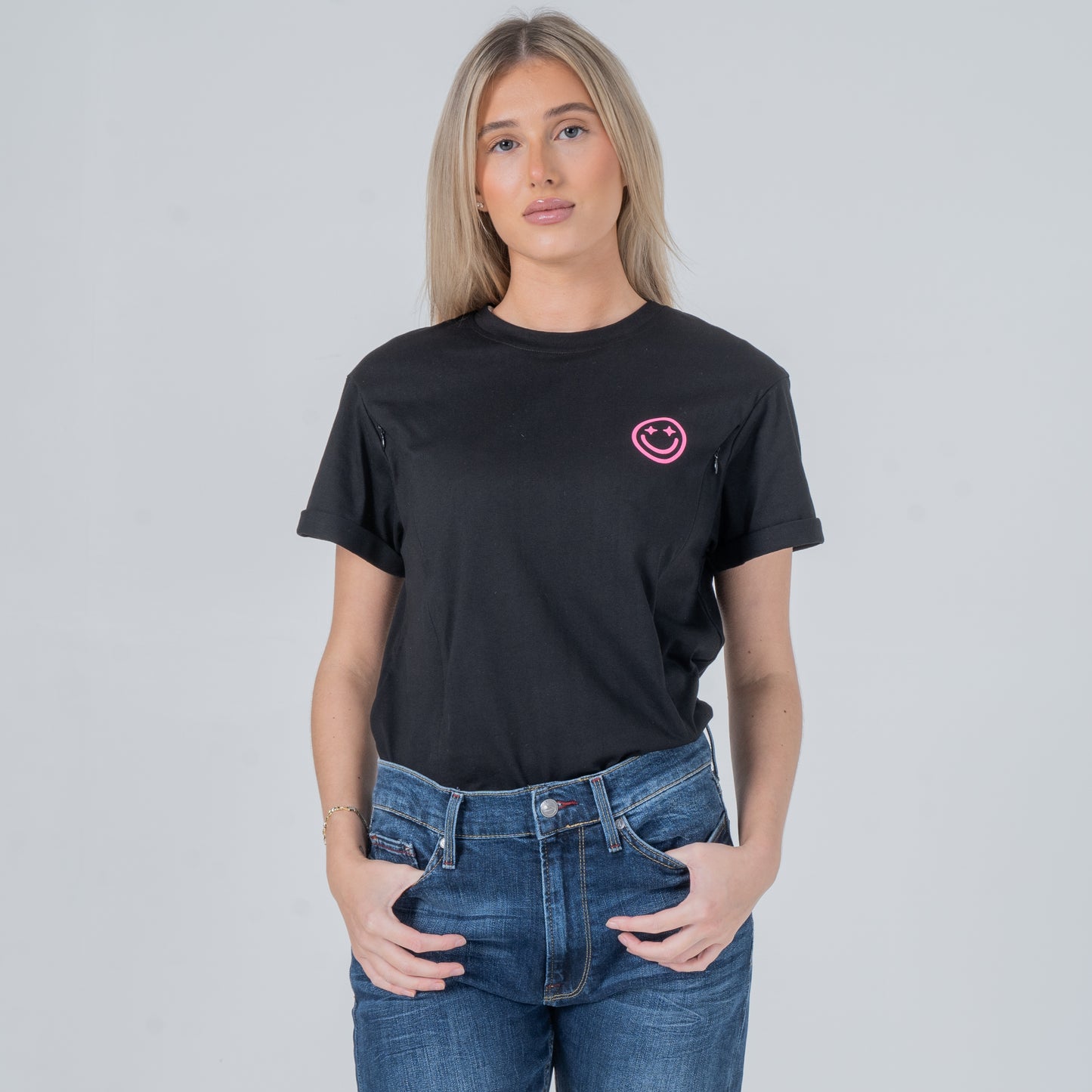woman wearing milkmates black nursing tee front tucked in