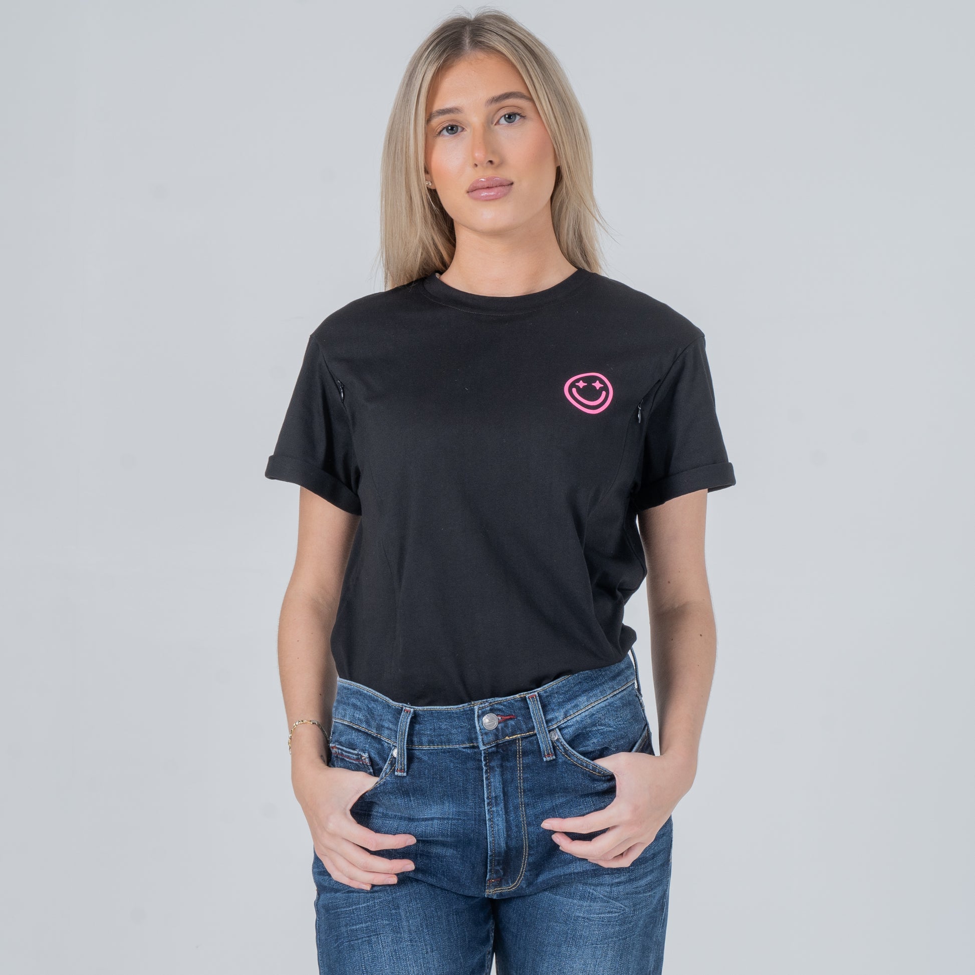 woman wearing milkmates black nursing tee front tucked in