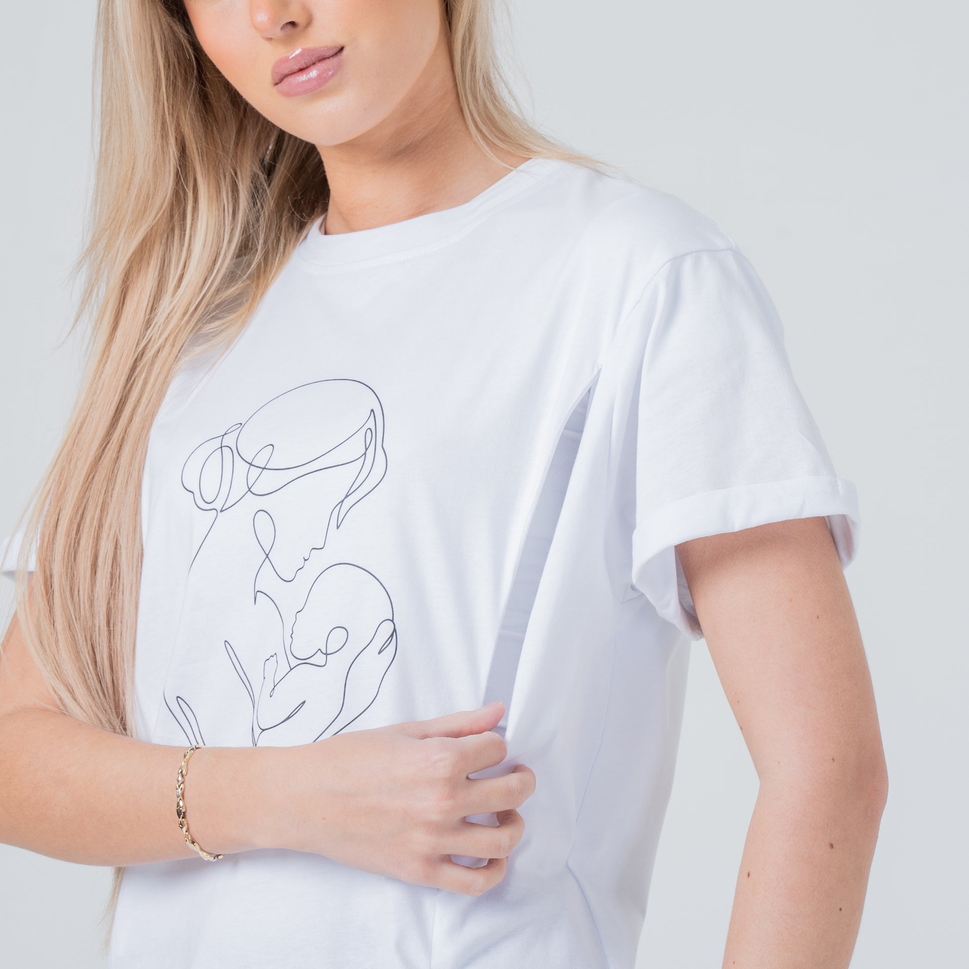 woman wearing milkmates motherhood white line art nursing tee zipper open